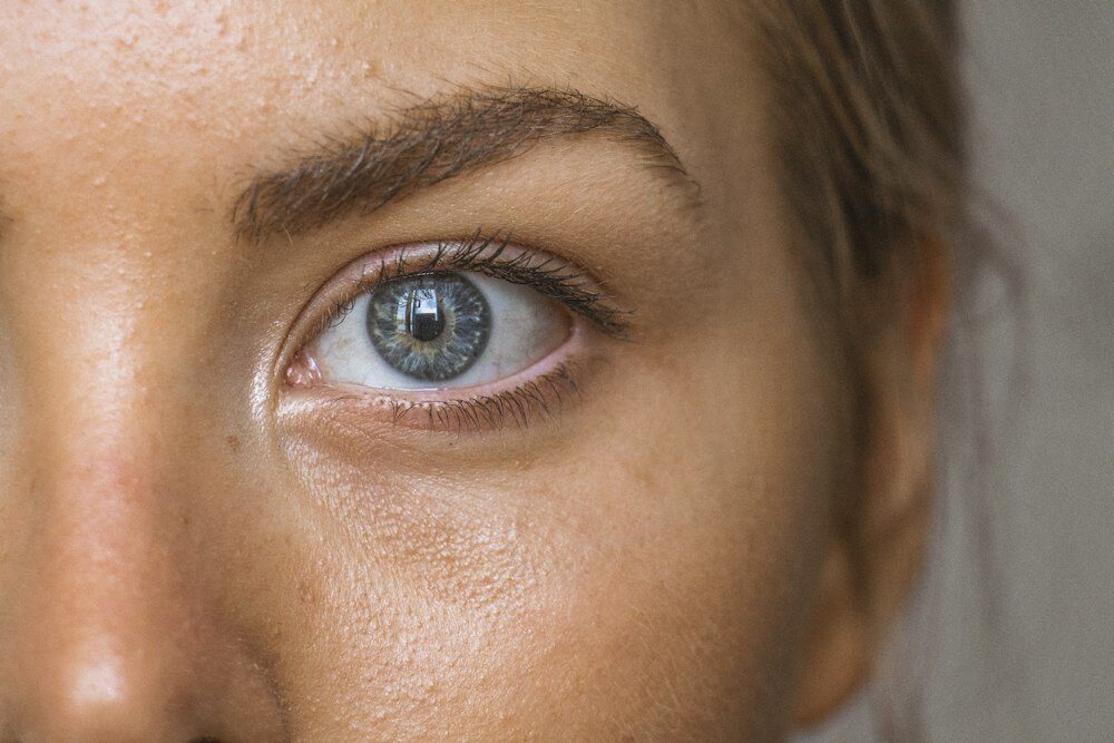 A close-up of a woman’s face.