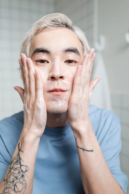 a man washing his face