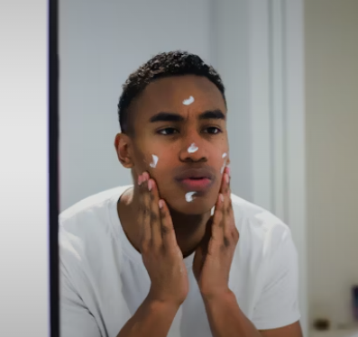 A man applying an SPF cream